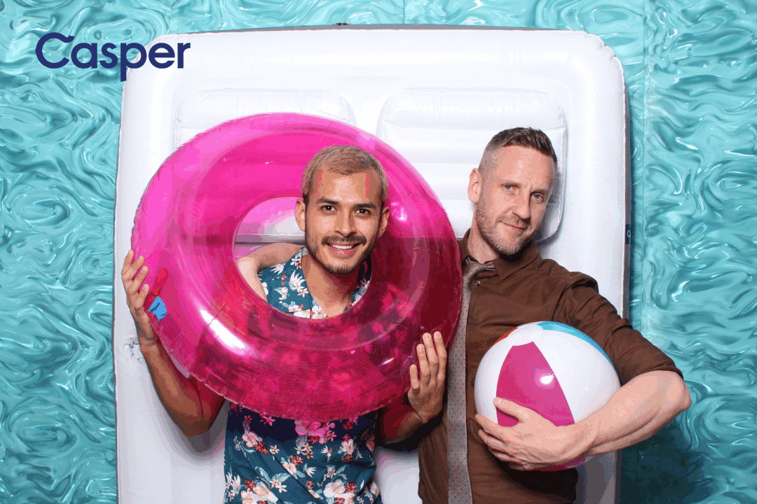 Casper Outdoor Summer Party GIF Booth Two men posing in an animated GIF with a pool float and beach ball at Casper's Summer Party