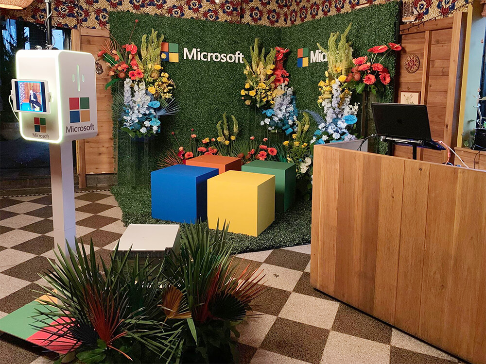 Custom Set Design Custom Set Design with floral and hedge walls for Microsoft Event